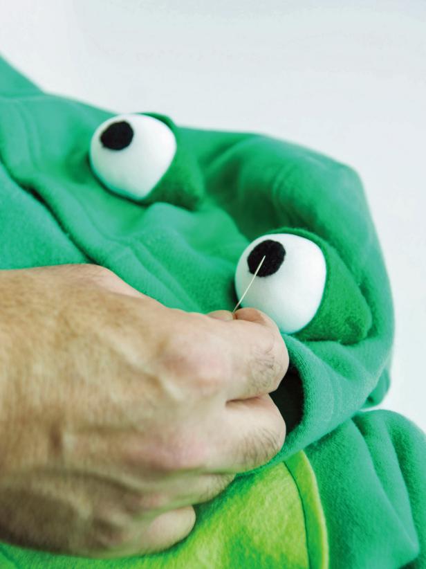 Handsew the eyeballs in place and attach black pupils.