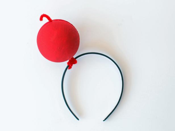 Place the pipe cleaner in between the foam pieces and hot glue them together. Shape/trim cherry stem as needed.