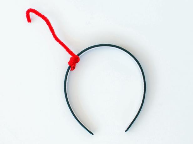 Paint additional coats as needed.Wrap red pipe cleaner around the headband (off to the side), leaving a long enough portion to fit through the foam ball and also have a stem. Secure with hot glue.