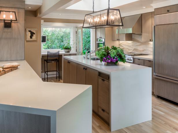 Contemporary Kitchen With White Waterfall Countertops Contemporary Kitchen With White Waterfall Countertops