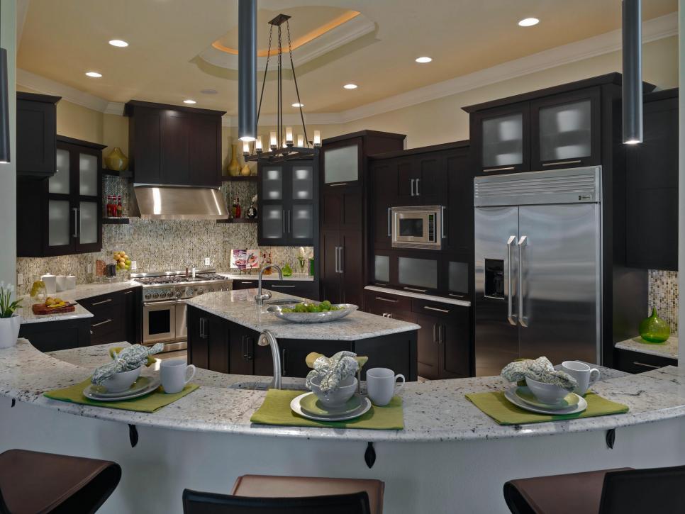 Large Kitchen With Curved Granite Countertop