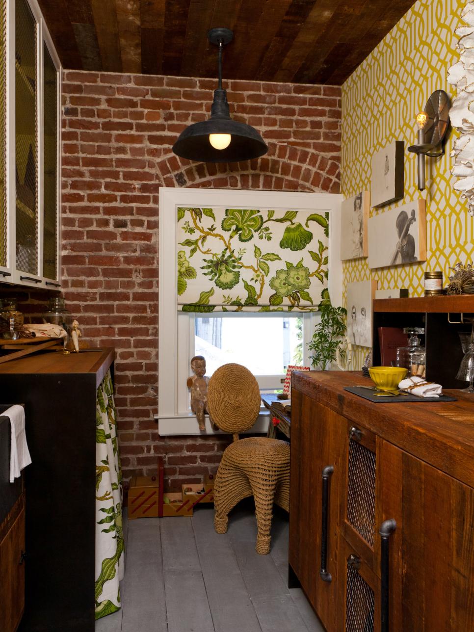 Utility Room With Brick Walls, Yellow Trellis Wallpaper and Wood Cabinet