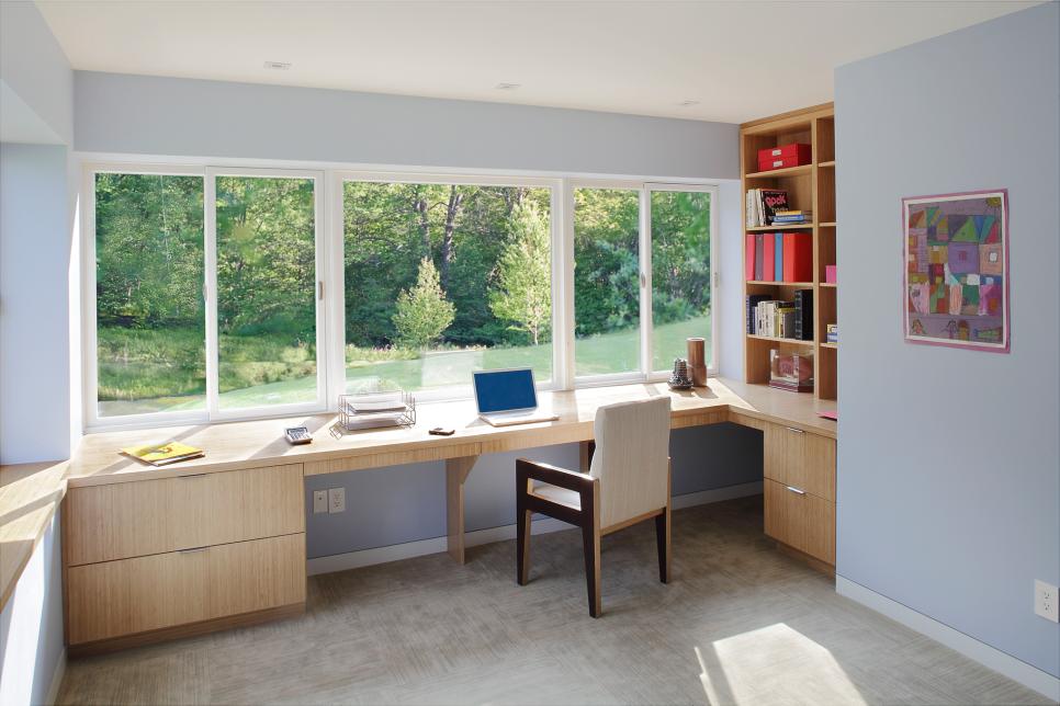Blue Home Office With Built-In Desk, Carpet, Armchair