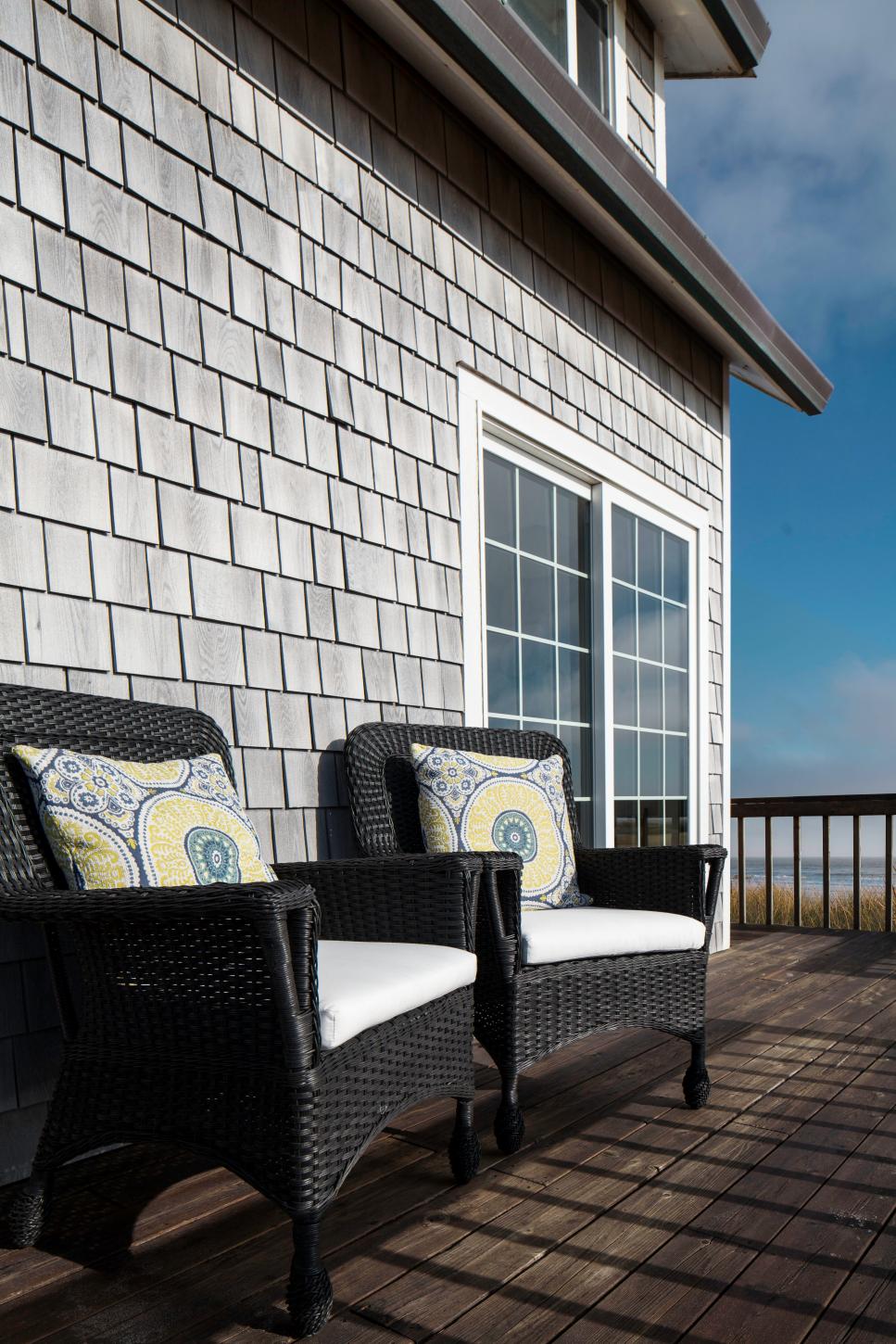 Coastal Deck With Black Wicker Armchairs Coastal Deck With Wicker Armchairs