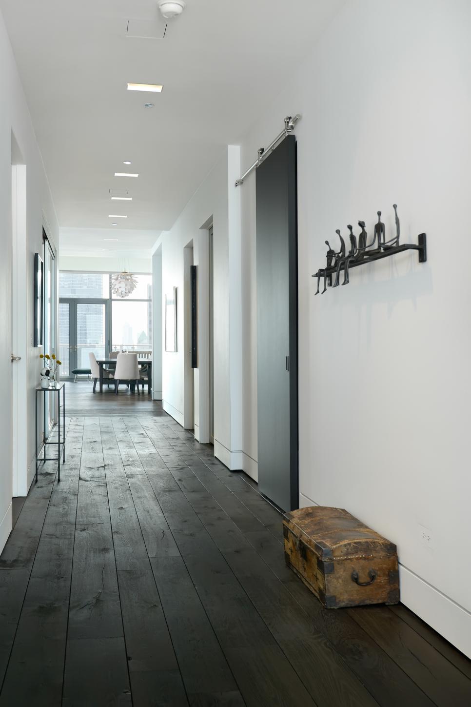 Minimalistic Hallway With Sliding Doors Modern White Hall With Black Accents