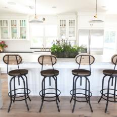 Cottage-Style Kitchen With Vintage-Inspired Bar Stools