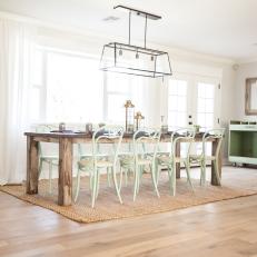 Open Dining Area With Rustic Table, Vintage Pieces
