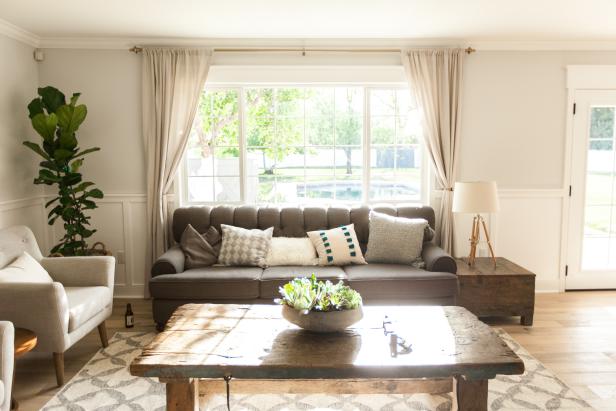 Cozy Living Room With Gray Sofa, Large Picture Window Cozy Living Room With Gray Sofa, Large Picture Window