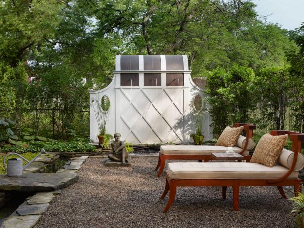 Tranquil Garden With Seating and White Storage Shed Tranquil Garden With Seating and White Storage Shed