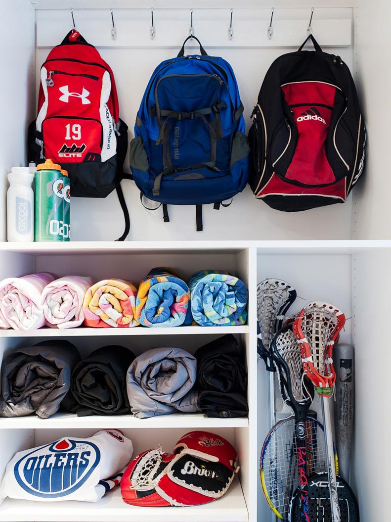 Backpacks and Sports Gear Stored in Closet