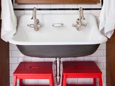 Kids' Bathroom With Bold Red Accessories