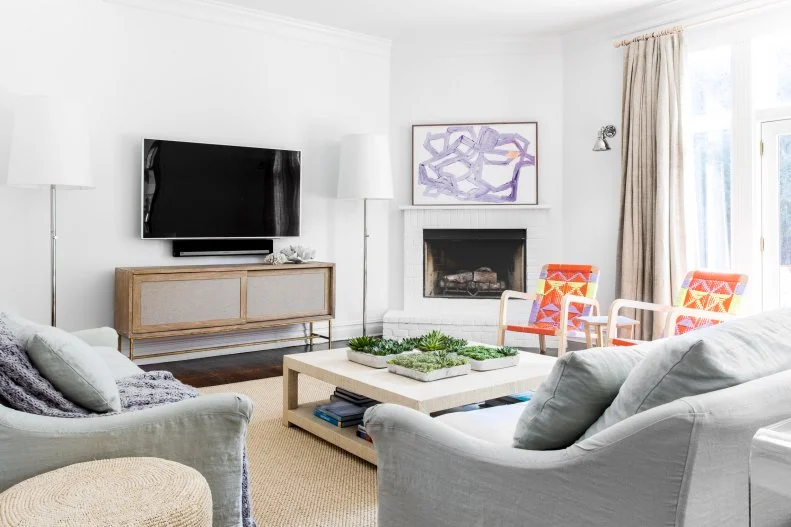 White Living Room With Neutral Furnitures and Accents