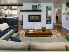 White Midcentury Living Room With Brick Fireplace