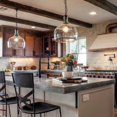 Exposed Beams and Brick Add Rustic Charm to Elegant Kitchen
