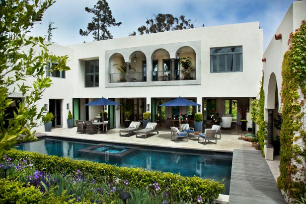 A Villa Courtyard Terrace is Decorated With Subtle Pool Furnishings A Villa Courtyard Terrace is Decorated With Subtle Pool Furnishings