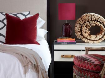 Eclectic Bedroom With Rich Chocolate Brown and Red Tones