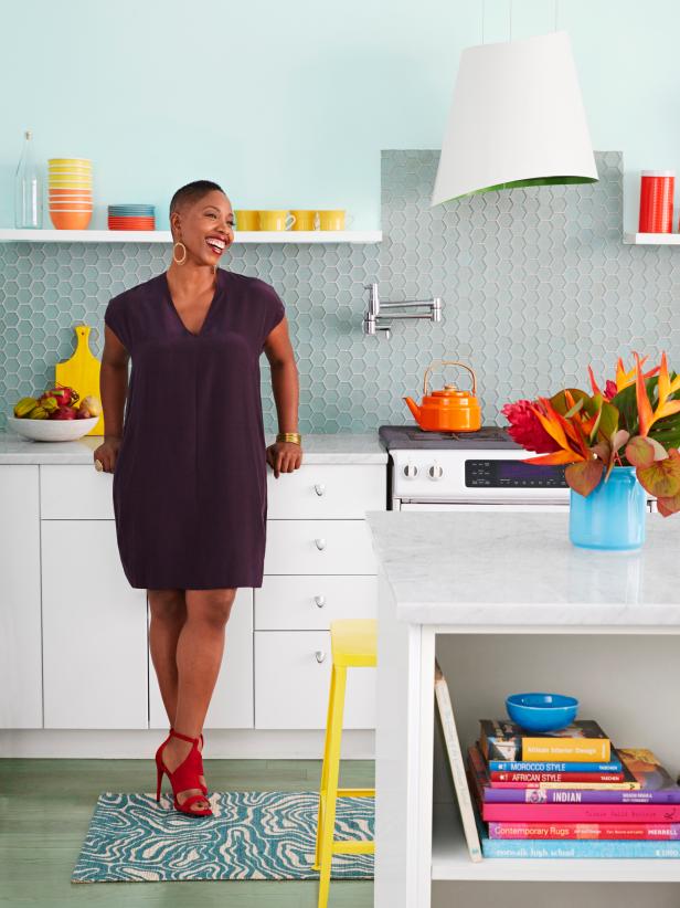 Women Standing in Her Colorful Kitchen Women Standing in Her Colorful Kitchen