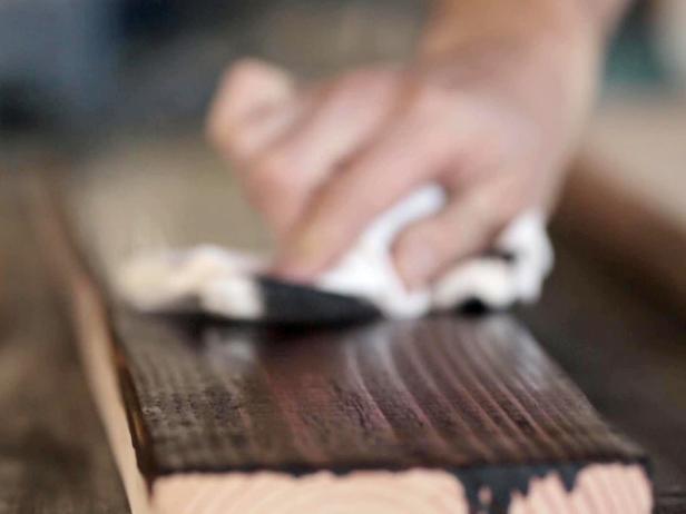 Add a layer of stain to make sure that your shelf has a finished look. Use a rag to show off the grain of the wood.