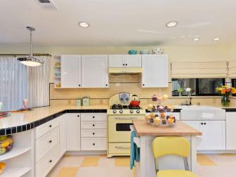 Sunny, Yellow Kitchen With Storage-Friendly White Cabinetry