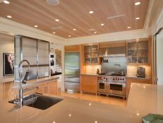 Neutral Contemporary Kitchen With Appliance Wall and Open Floor Plan