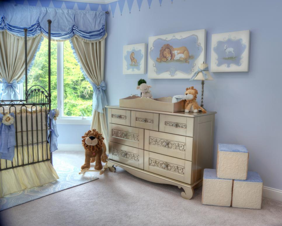 Baby Blue Nursery Boasts Antique Silver Changing Table Light Blue Nursery With Animal-Themed Art and Metallic Changing Table