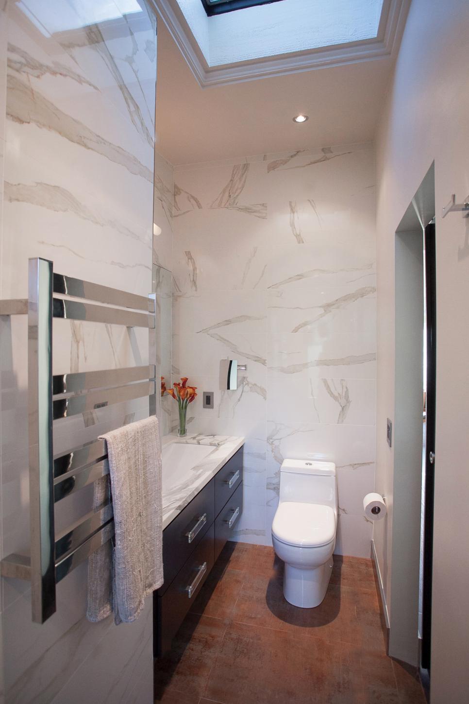 White Marble Bathroom With Towel Rack White Marble Bathroom