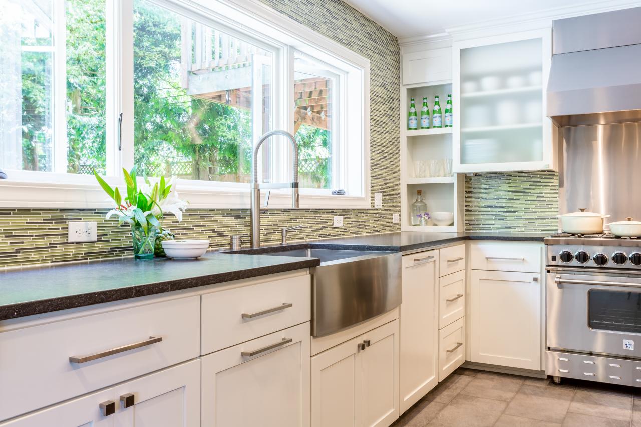 white kitchen cabinets green backsplash