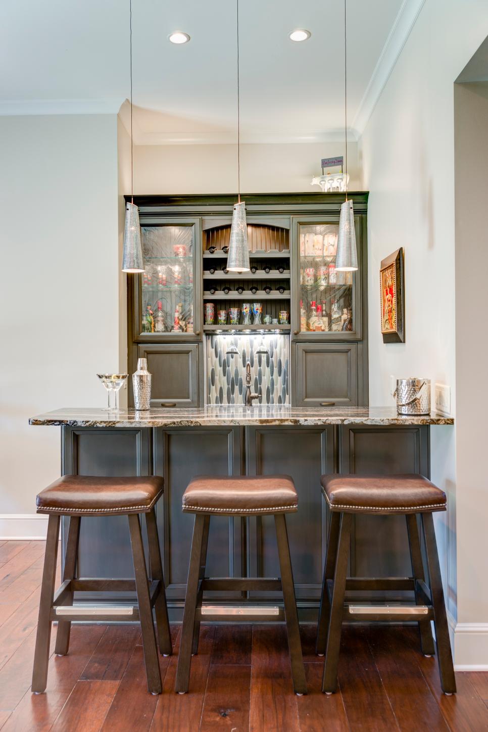Sophisticated Bar With Leather Stools Home Bar With Contemporary Pendant Lights