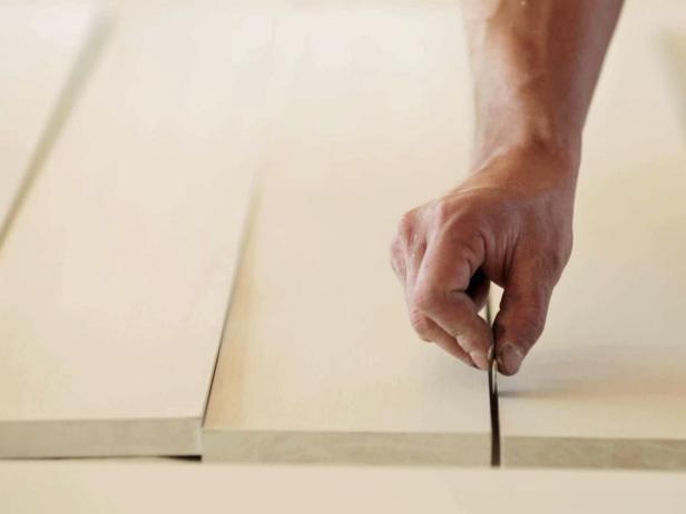 Make a midcentury modern-style coffee table lumber and tapered furniture legs.