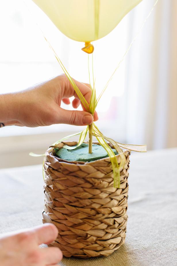 Insert the dowel into the middle of the floral foam.