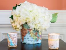 Use a map of a favorite location to give a plain glass vase or votive a globe-trotting makeover.