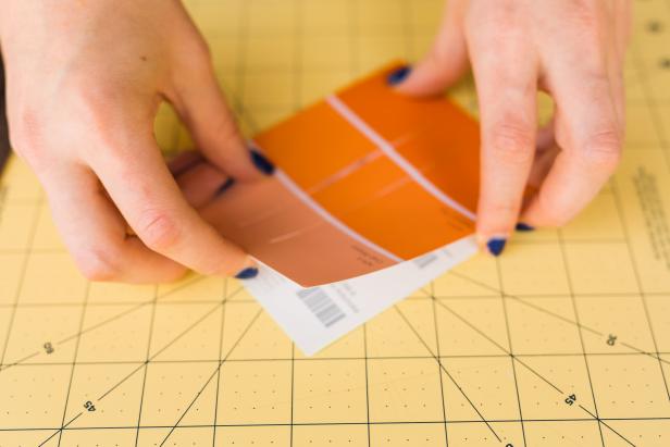 Glue the party information to the flat side of the invitation.