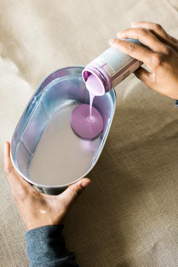 Pour the chalkboard paint into a bucket or bowl deep enough that the glass bottom can be fully submerged. TIP: Clean the base of each glass by wiping them with a clean cloth dipped in rubbing alcohol.