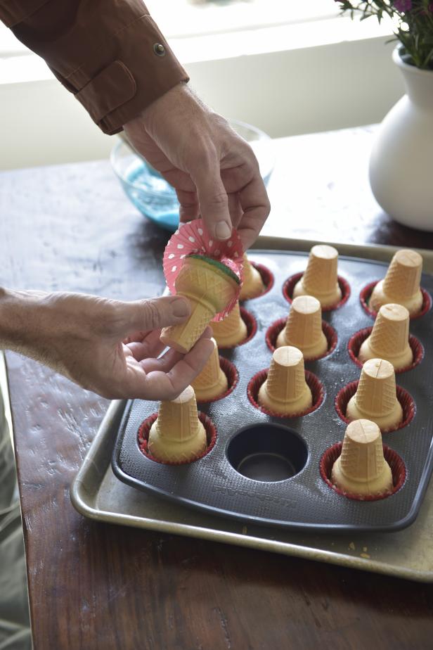 Once cooled, remove paper baking cups from each cupcake.