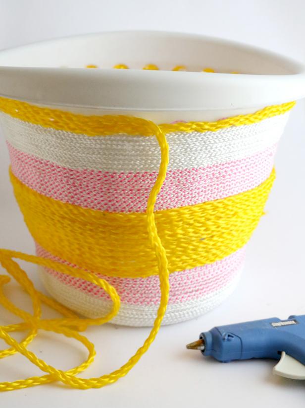 Continue to alternate colors creating a colorful stripe pattern. Use ropes of varying thickness to create texture and interest.