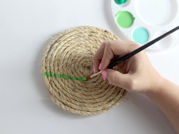When dry, add fun stripes with the acrylic paint. Make each trivet slightly different and interesting.