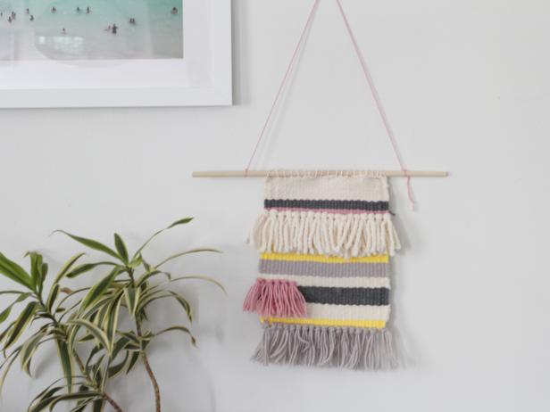 Wall Tapestry Use a wooden handloom to create a custom, woven tapestry for your wall. Use any colors or types of yarn to create stripes and fringe. This project can easily be finished in a few nights while watching your favorite TV show.
