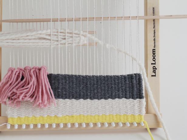 Now keep creating stripes all the way across the loom.