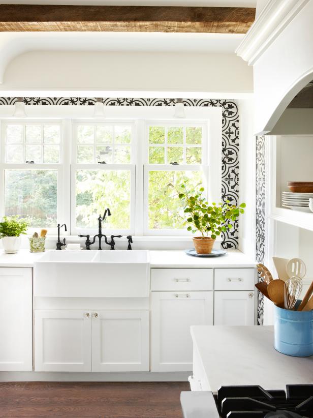 Small White Kitchen With Wood Beams and Patterned Tile Small White Kitchen With Wood Beams and Patterned Tile
