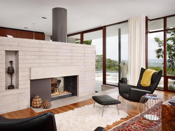 Cozy Midcentury Modern Living Room With Two-Sided Fireplace Cozy Midcentury Modern Living Room With Two-Sided Fireplace