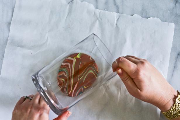 Make Mom a clay jewelry dish this Mother's Day. The turquoise and gold marbled accent colors add glamour to the terra cotta-colored dish.
