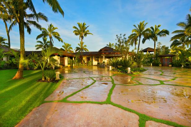 Stone Driveway Leads to Tropical Estate Stone Driveway Leads to Tropical Estate