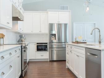 Coastal Kitchen With White Cabinets & Wood-Look Tile Floors