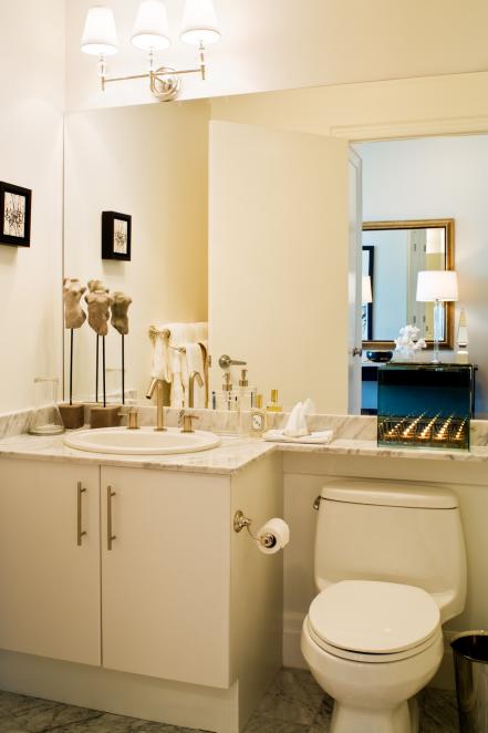 Don't ... Hang a Small Mirror in a Small Bathroom
