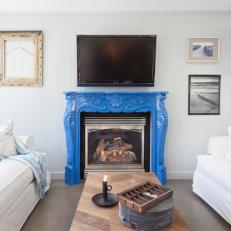 Bright Blue Fireplace in Living Room
