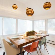 Custom Table and Unique Pendant Lights in Dining Room