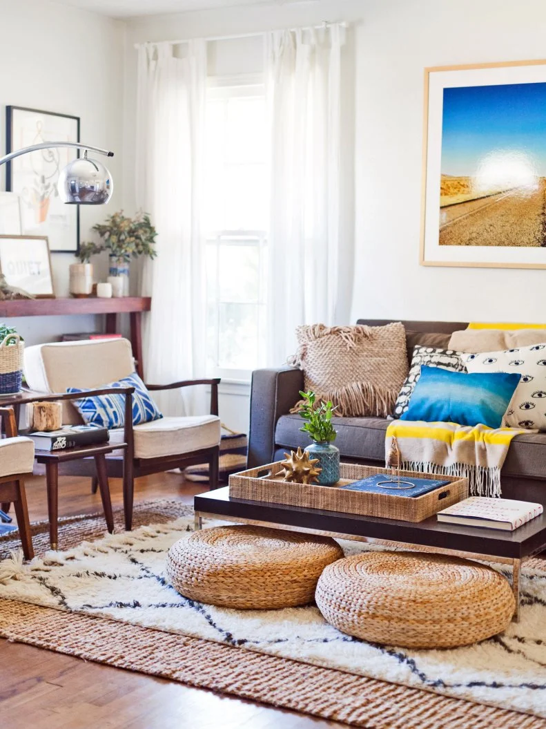 Living room with low furnishings to maximize vertical space.