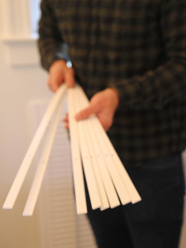 1/8" filler strips are included with the shutters to adjust the width if necessary. They also serve as a great template to use for layout.