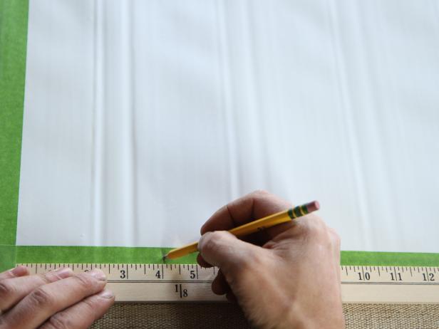 Starting at the bottom measure 4â vertically on both sides and make a mark