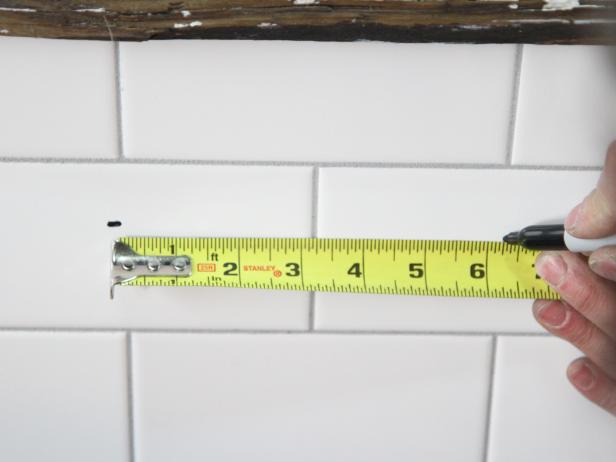 Measure and mark 6 ¼â from the original marks for the left side mounting plate